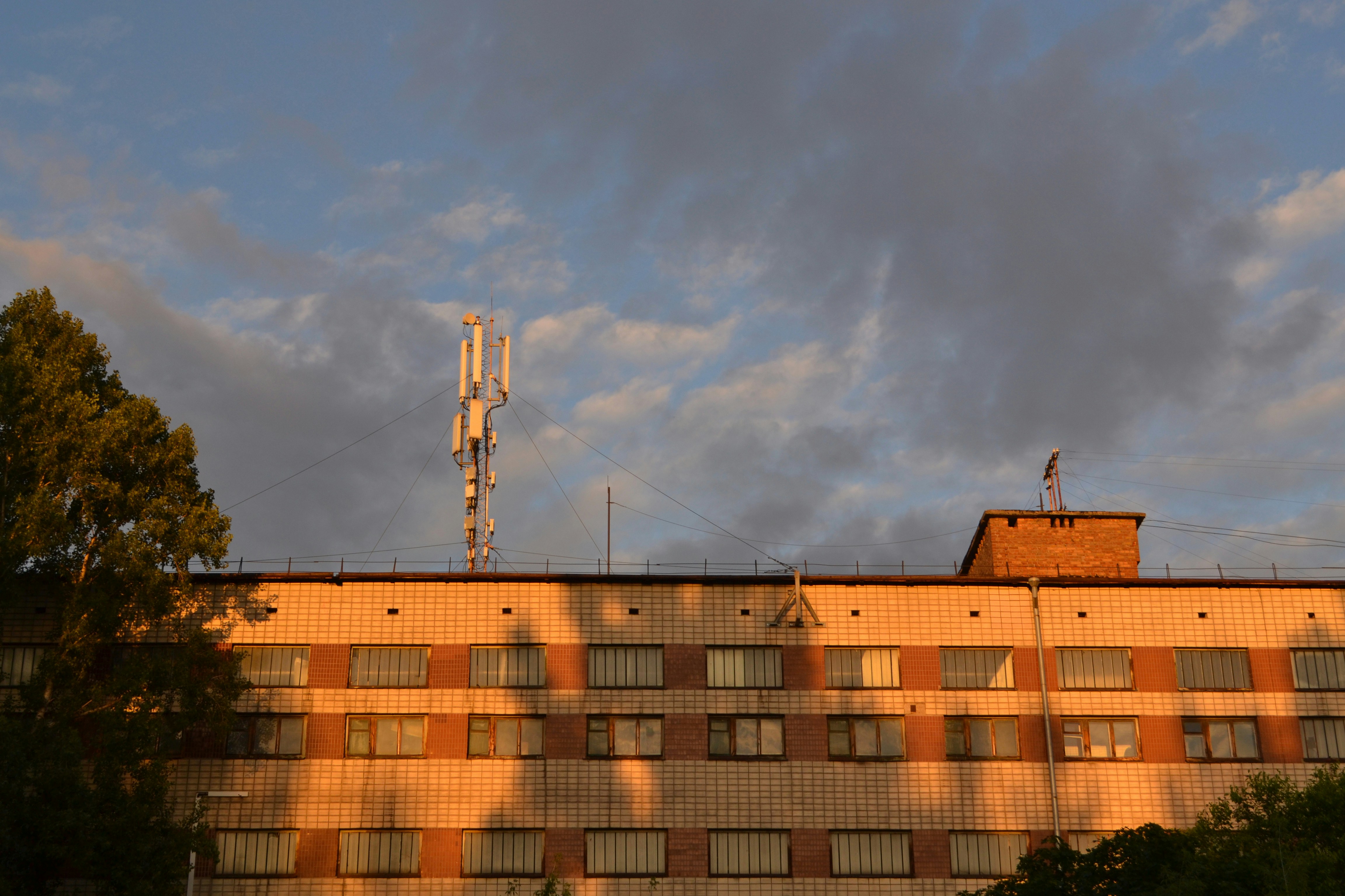 A tall building with a clock tower on top of it