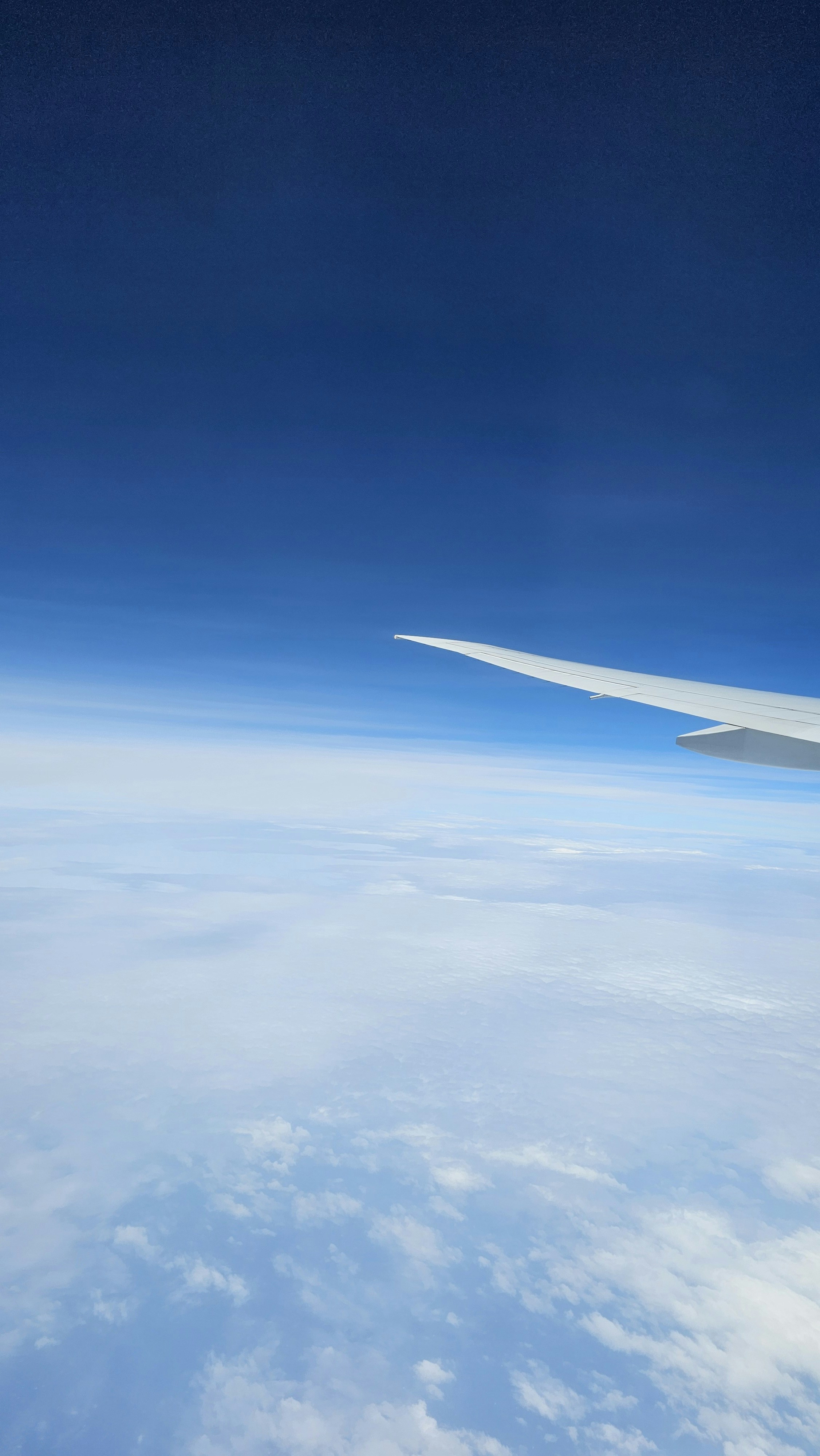 A view of the wing of an airplane in the sky photo – Free Nature Image ...