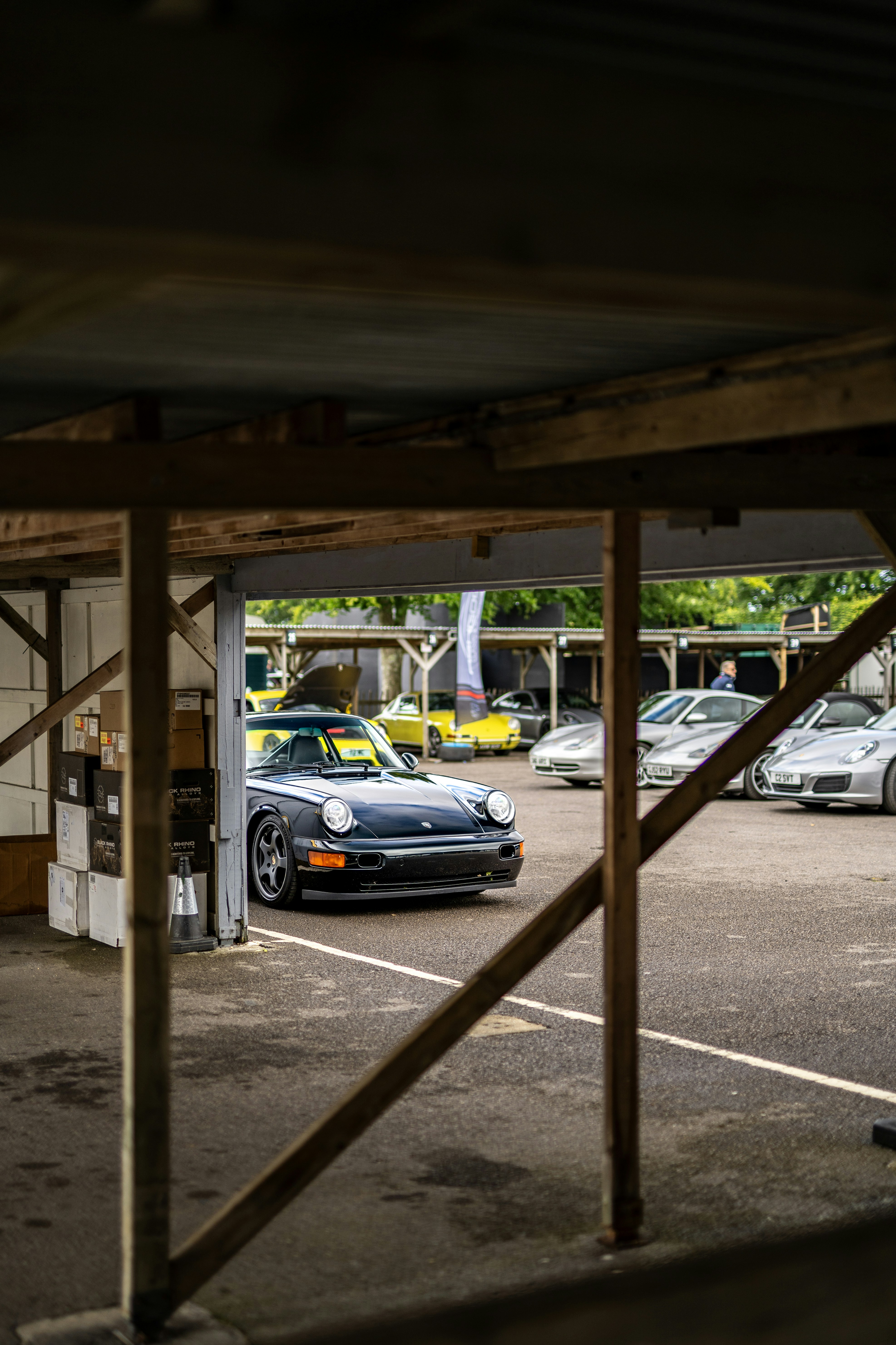 Car rental area with a selection of vehicles ready for hire