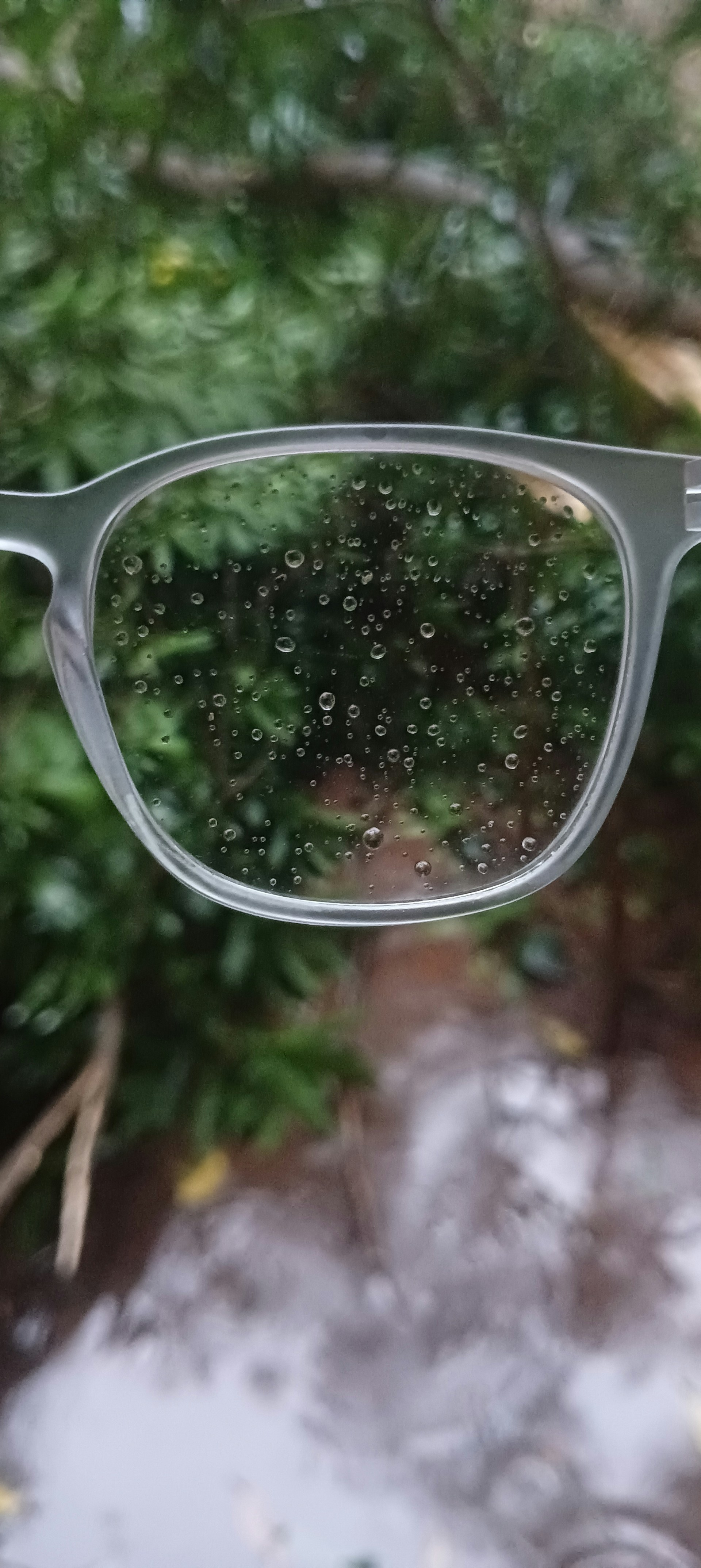 A pair of glasses sitting on top of a table