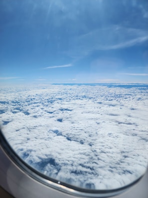 A view of the clouds from an airplane window