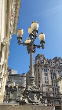 A lamp post in front of a large building
