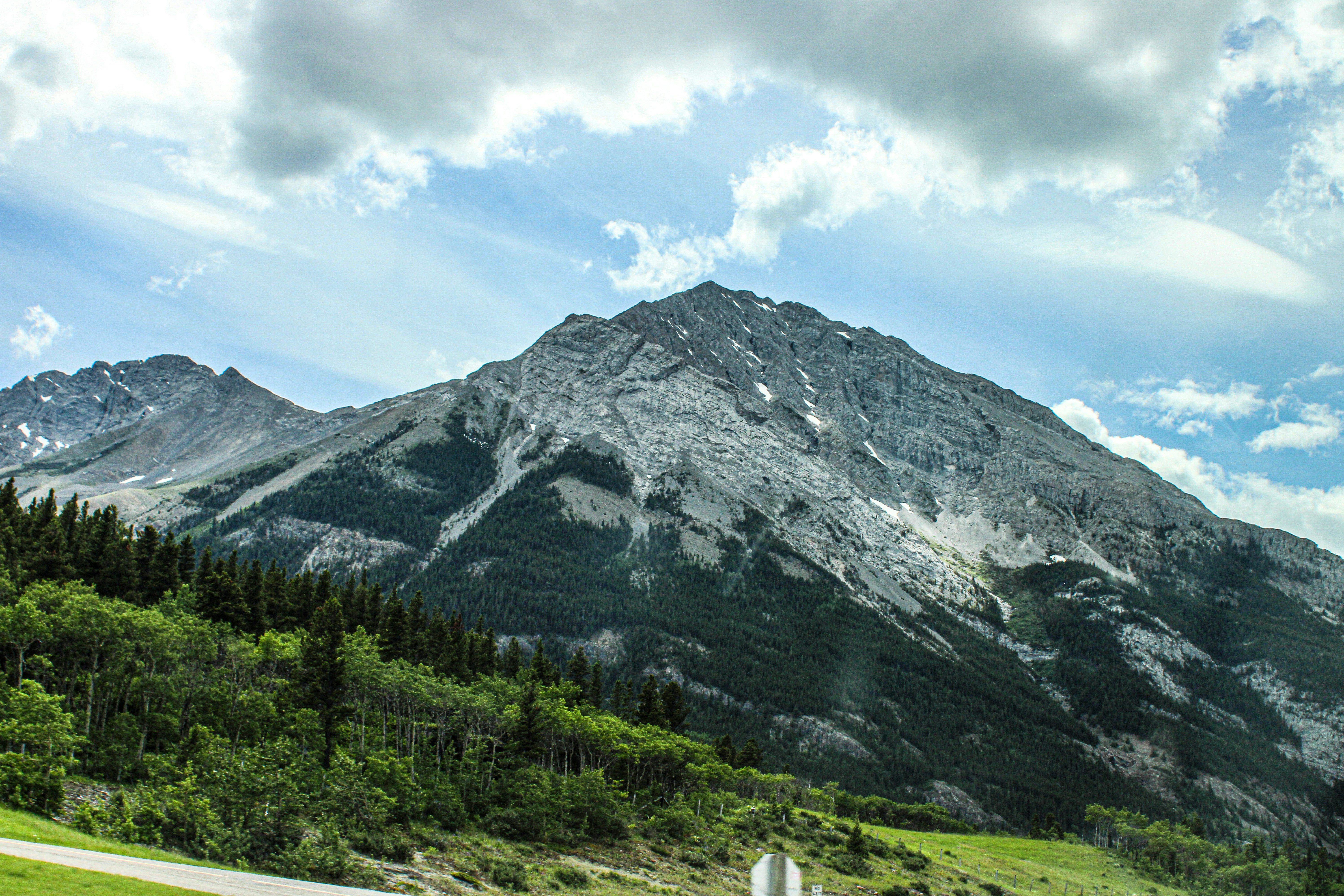 A road with a mountain in the background