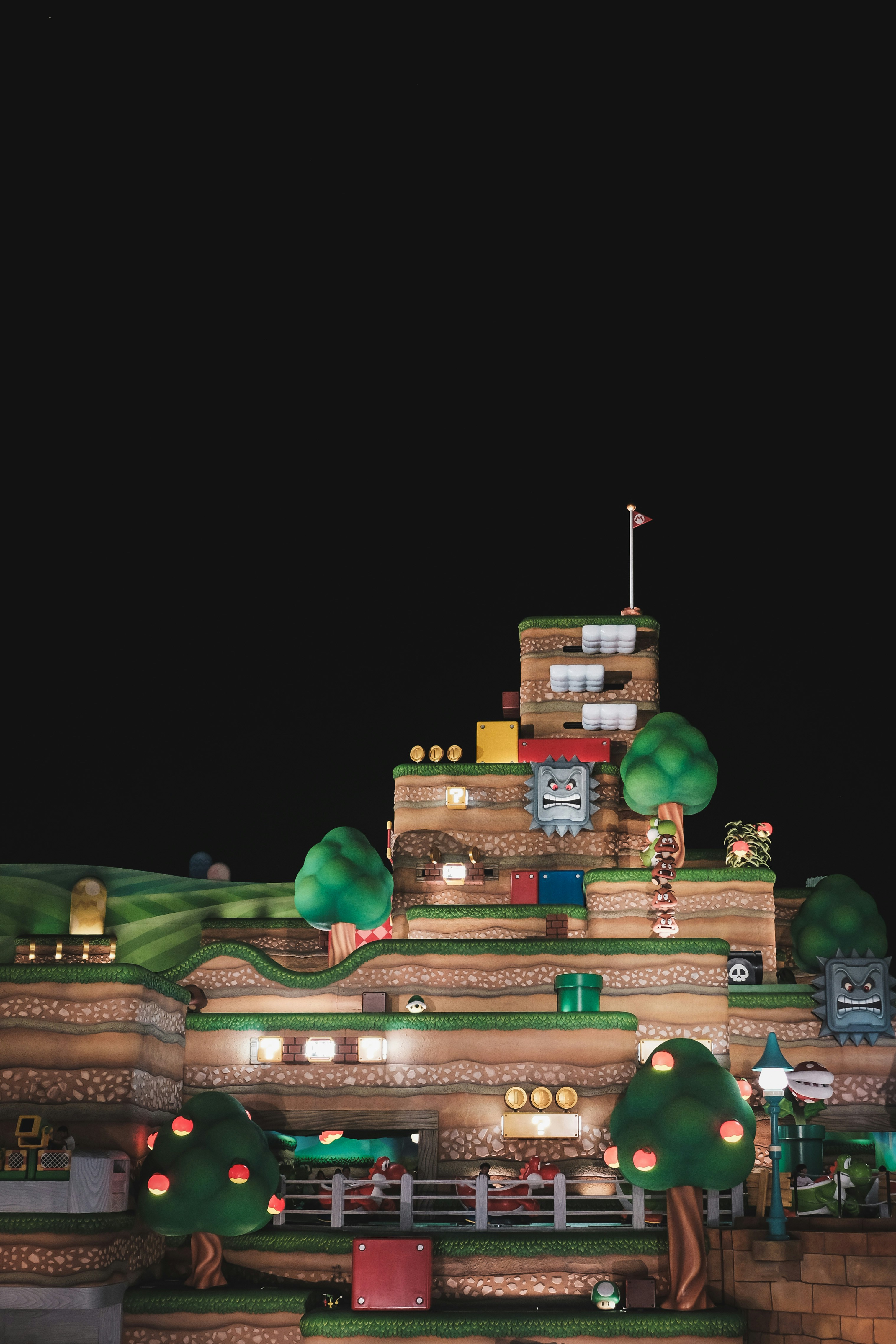 A large building made out of legos and lights