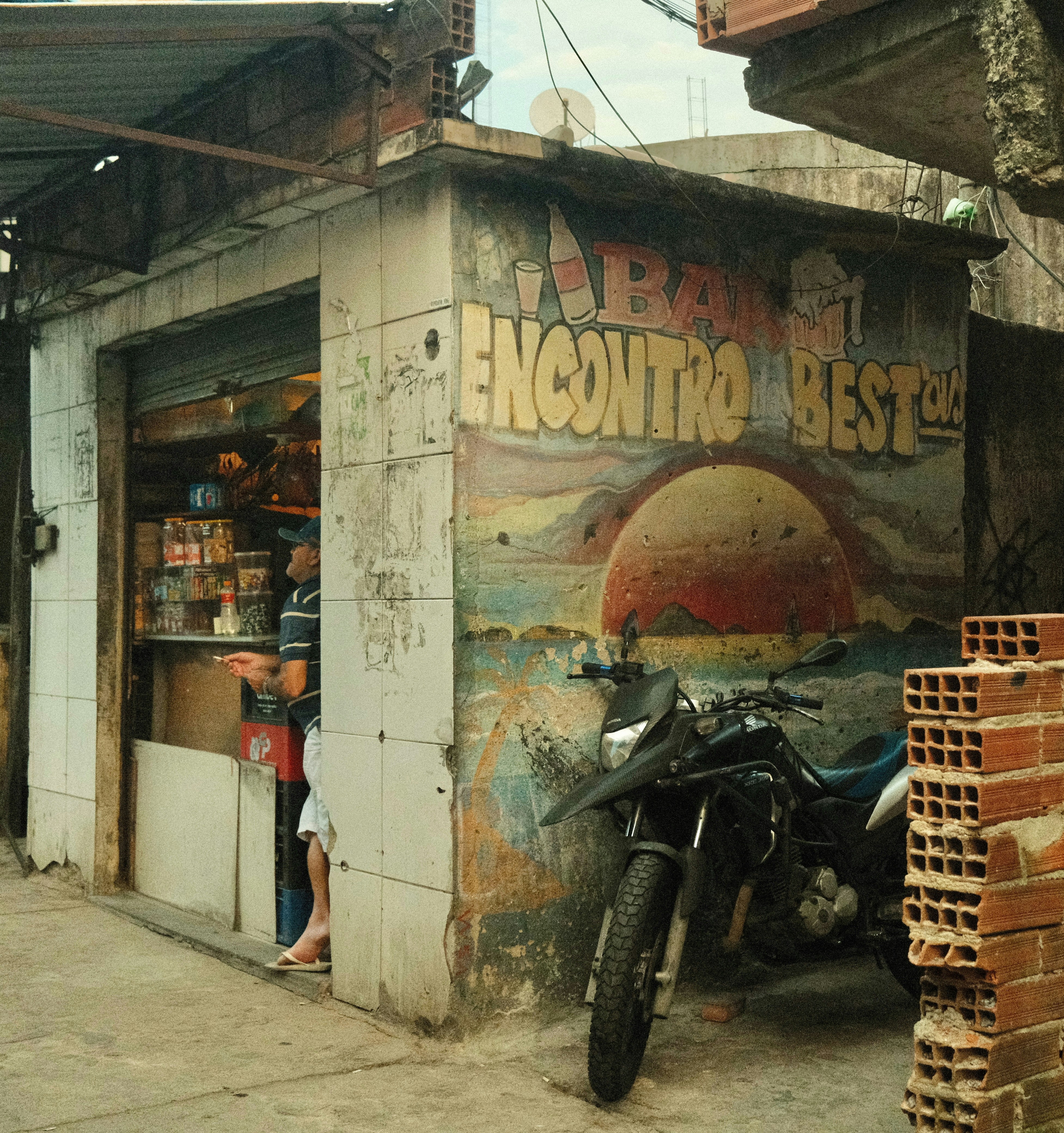 A motorcycle parked in front of a store