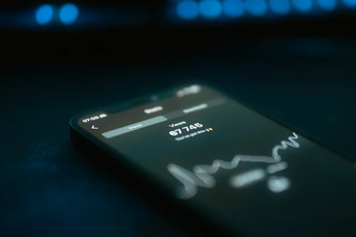 A close up of a cell phone on a table