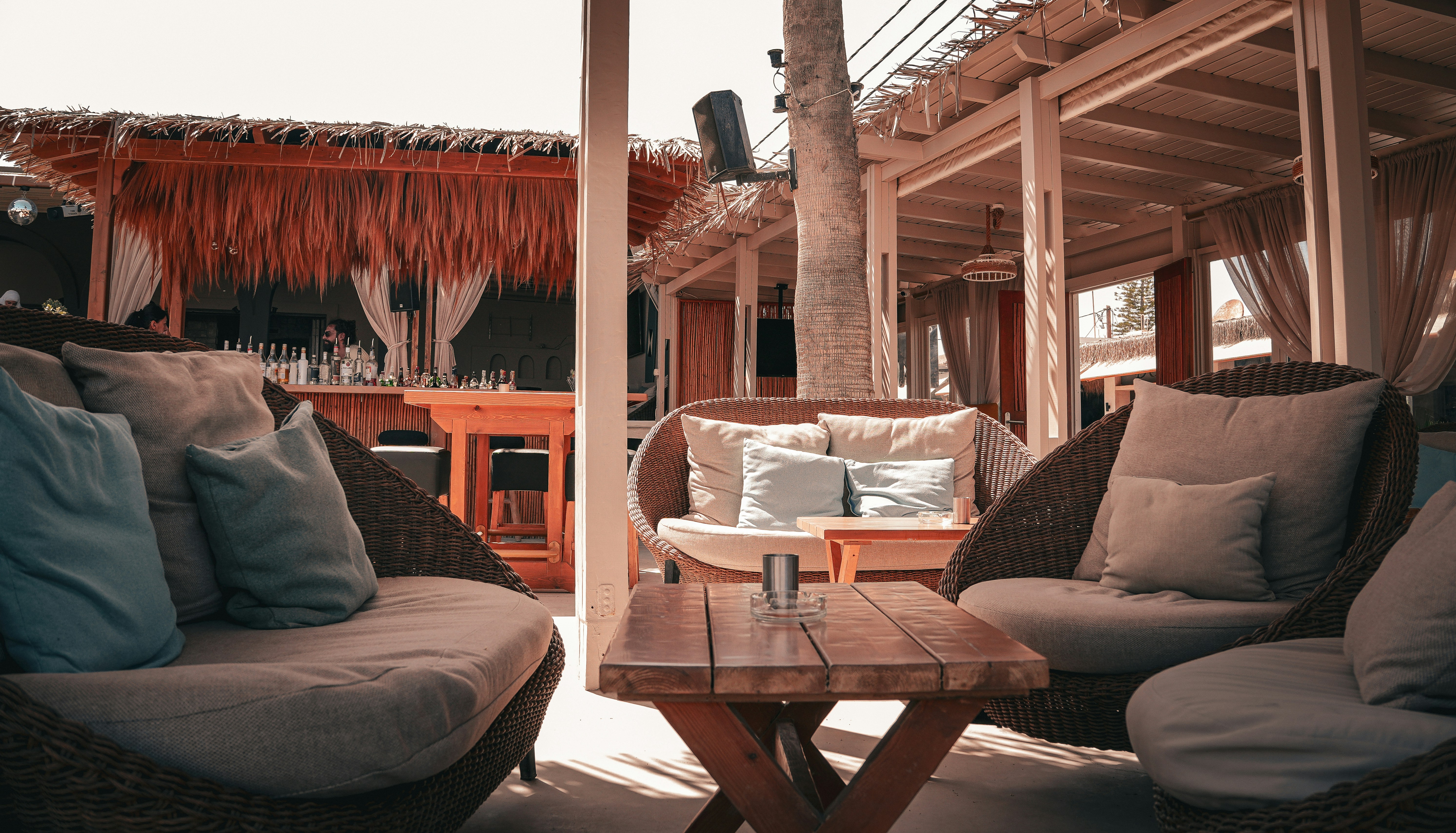 A couple of couches and a table in a room