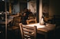 A person sitting at a table in a restaurant