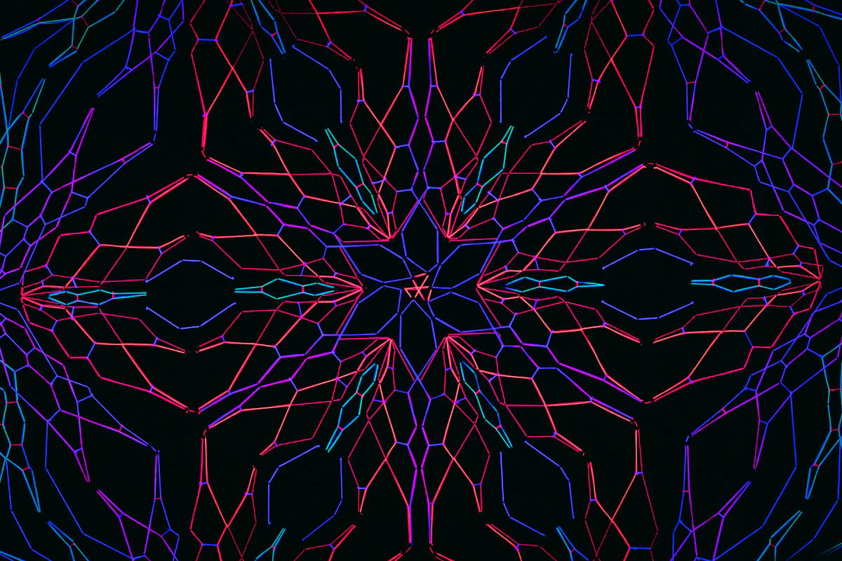 A rainbow mandala mapping chakra colors onto sacred geometry