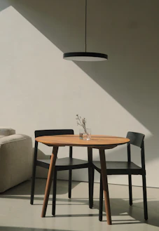 A living room with a couch and a table