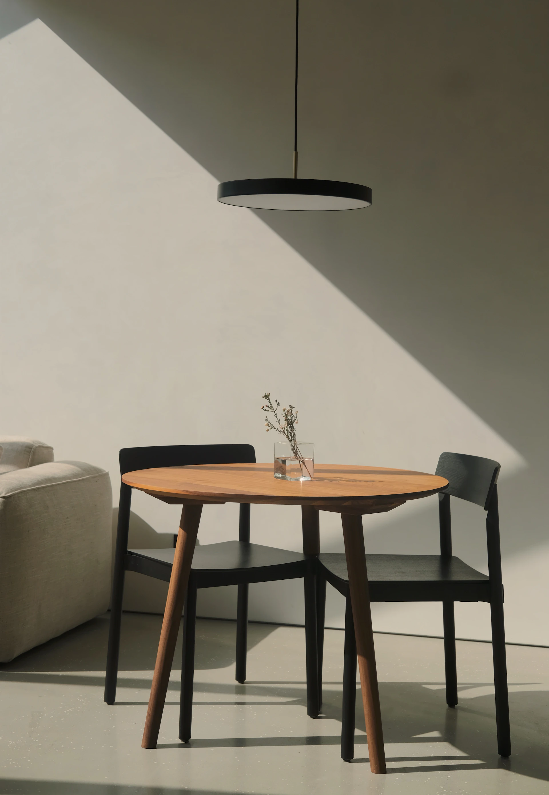 A living room with a couch and a table