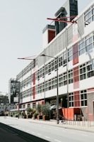 A large building with many windows on the side of it