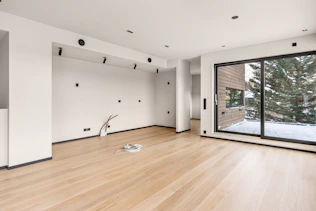 An empty room with a lot of windows