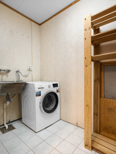 A washer and dryer in a small room