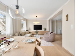 A living room and dining room area of a house