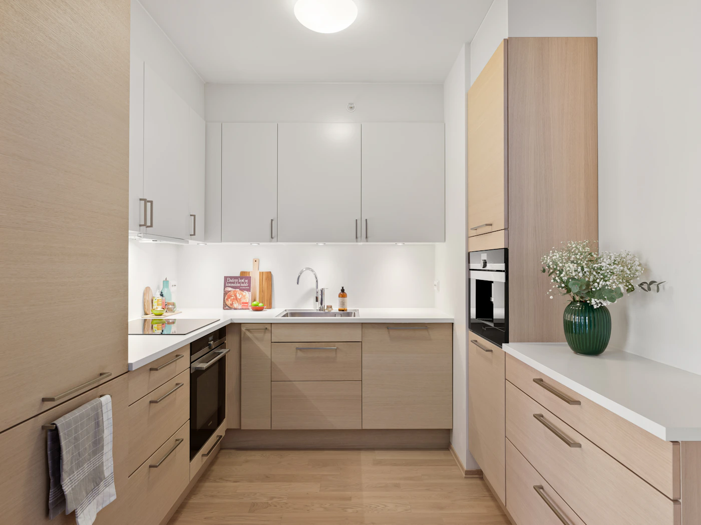 Kitchen renovation with modern cabinetry and countertops