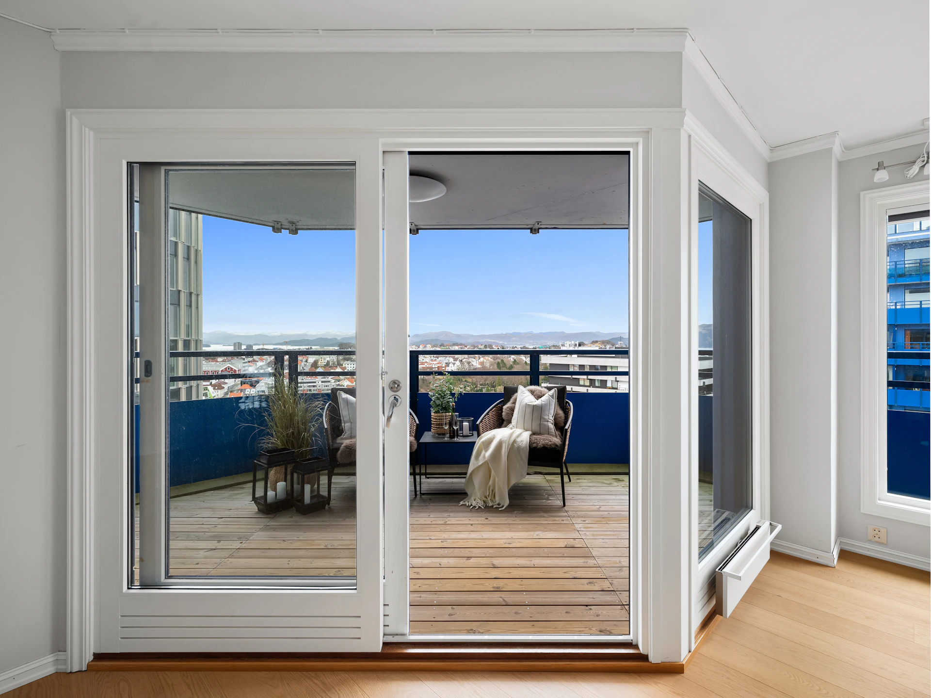 A living room with a large sliding glass door
