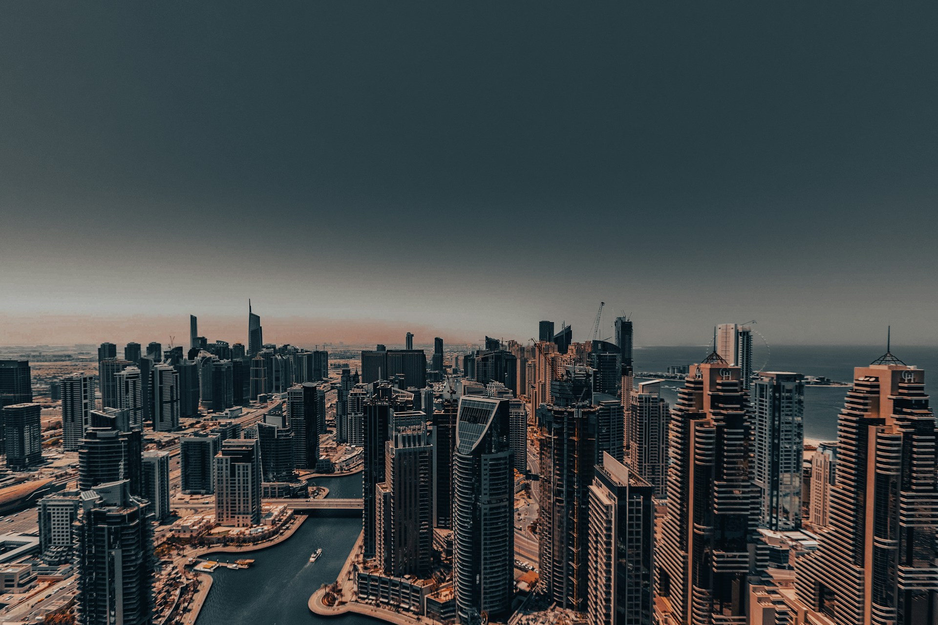 An aerial view of a city with a river running through it