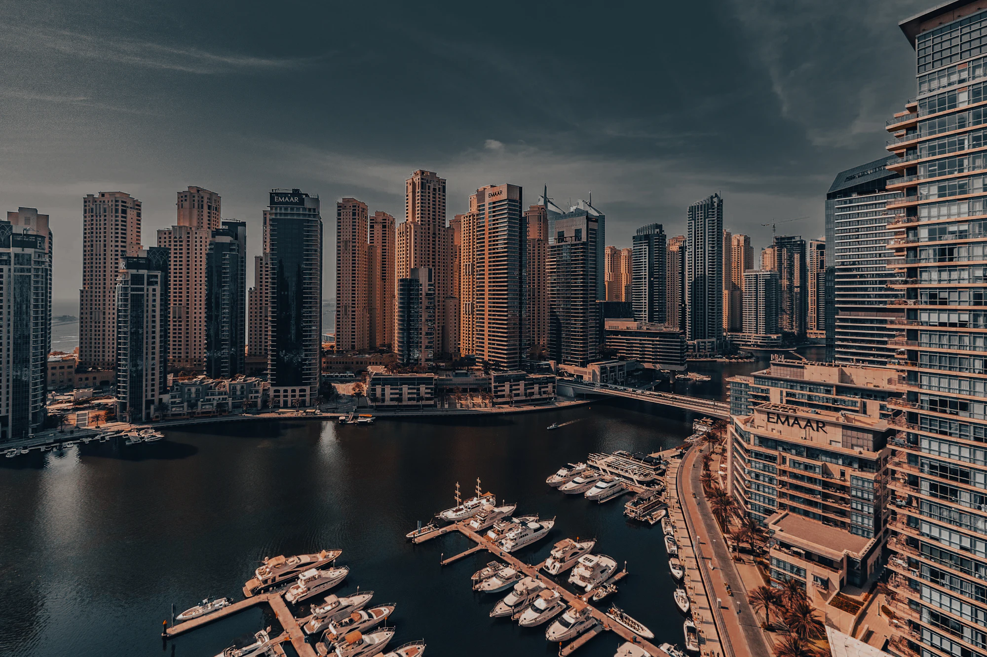 Dubai Marina towers surrounding yacht berths