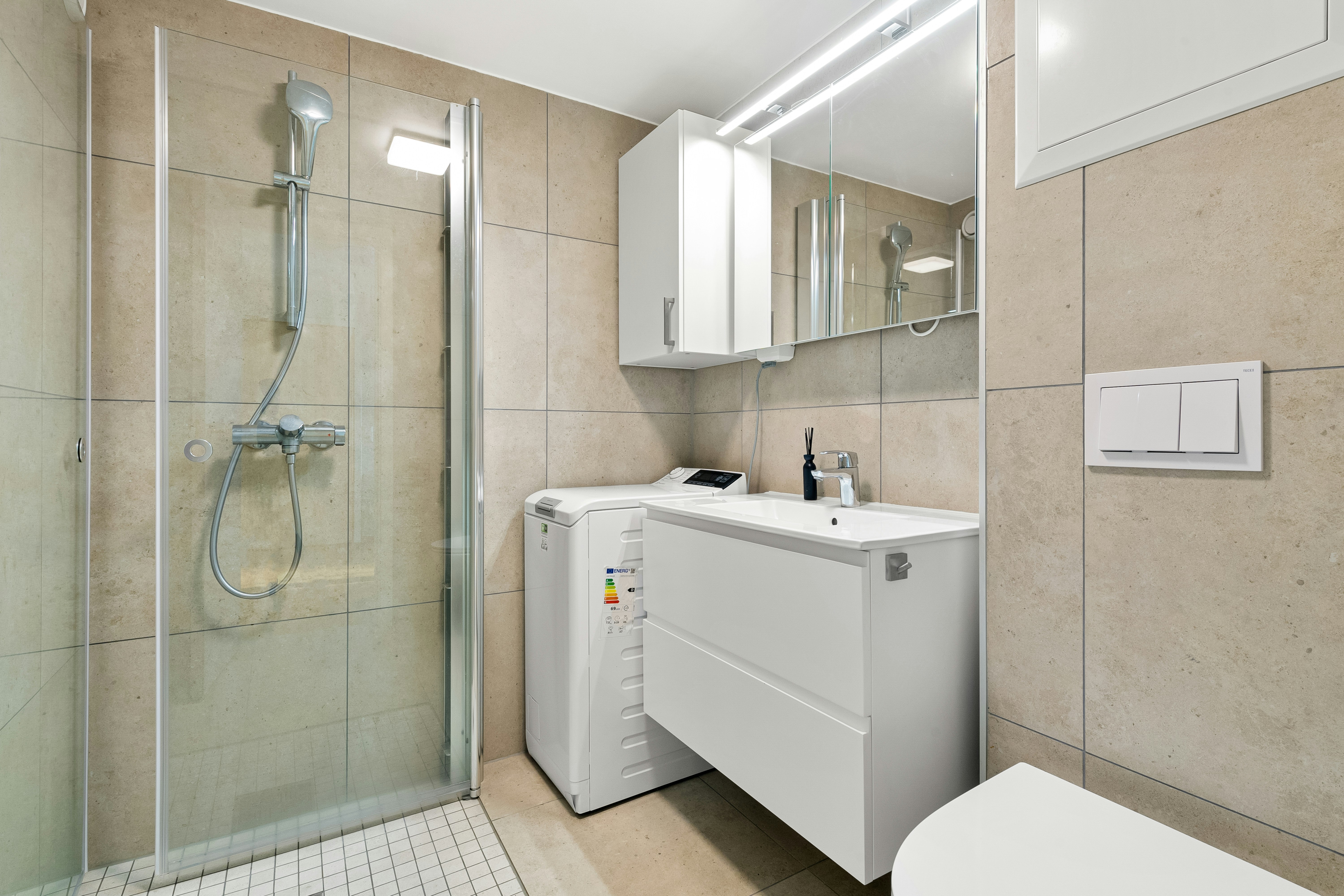 Premium hotel bathroom with microcement walls and modern fixtures