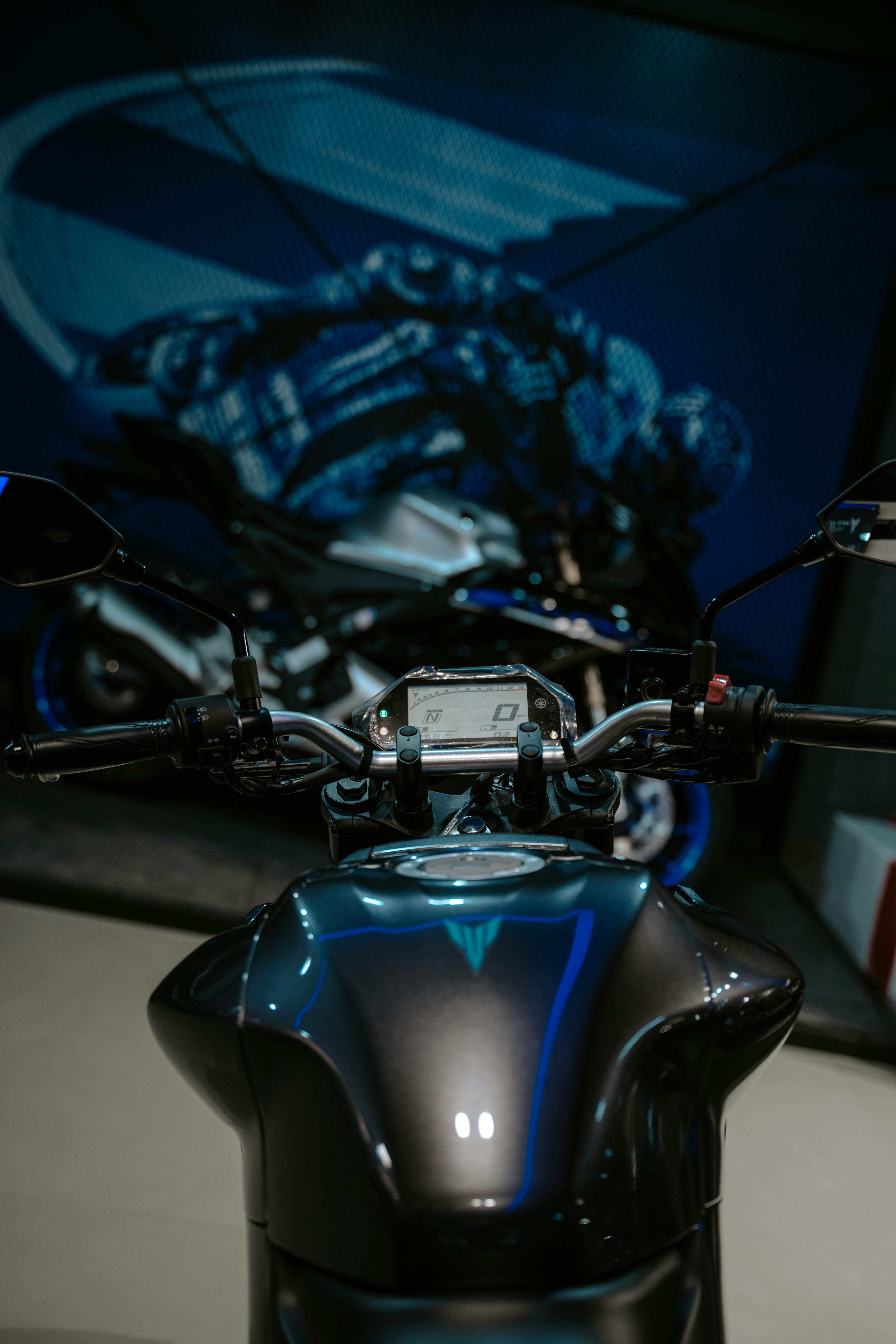 A close up of a motorcycle on display