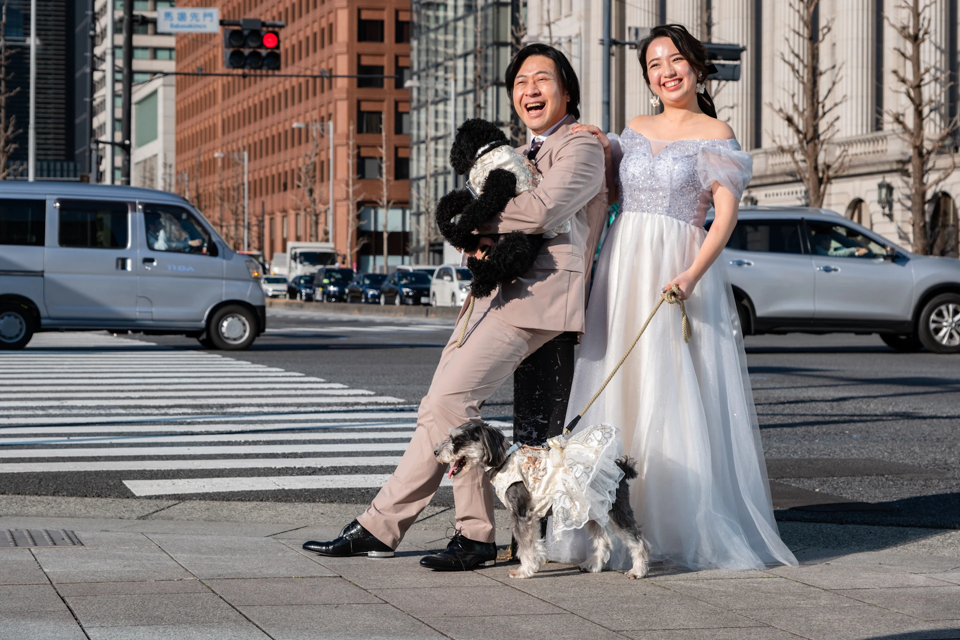 A man and a woman posing for a picture with a dog
