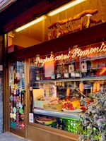 A store front with a lot of items in it
