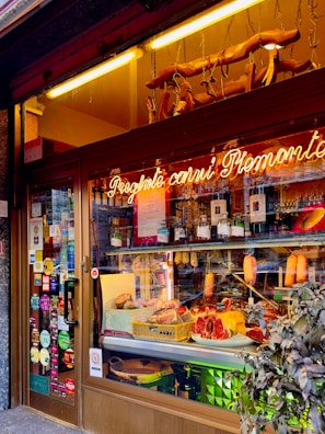 A store front with a lot of items in it
