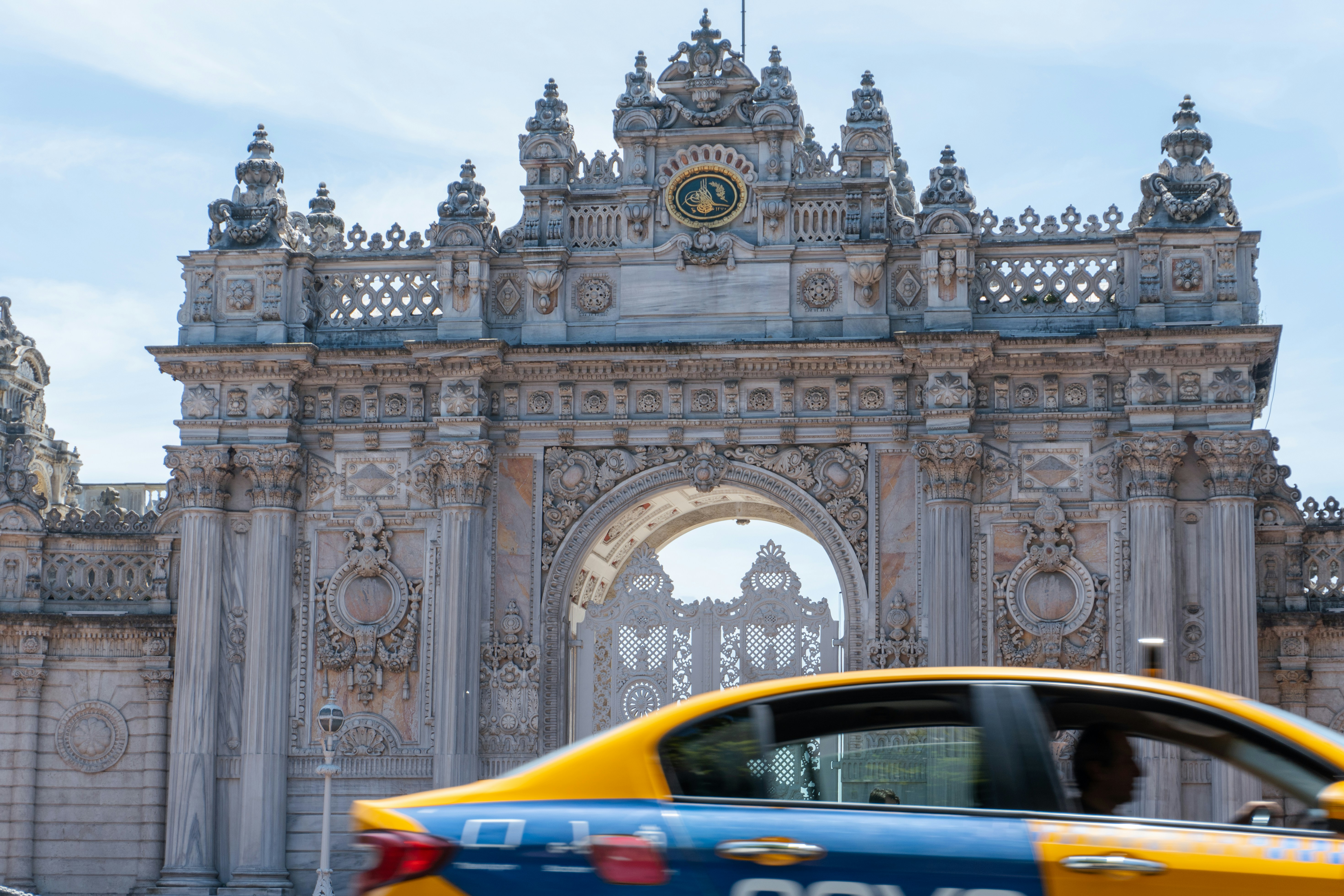A police car parked in front of a building, 