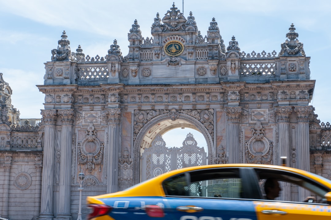 A police car parked in front of a building,