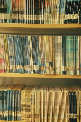 A book shelf filled with lots of books