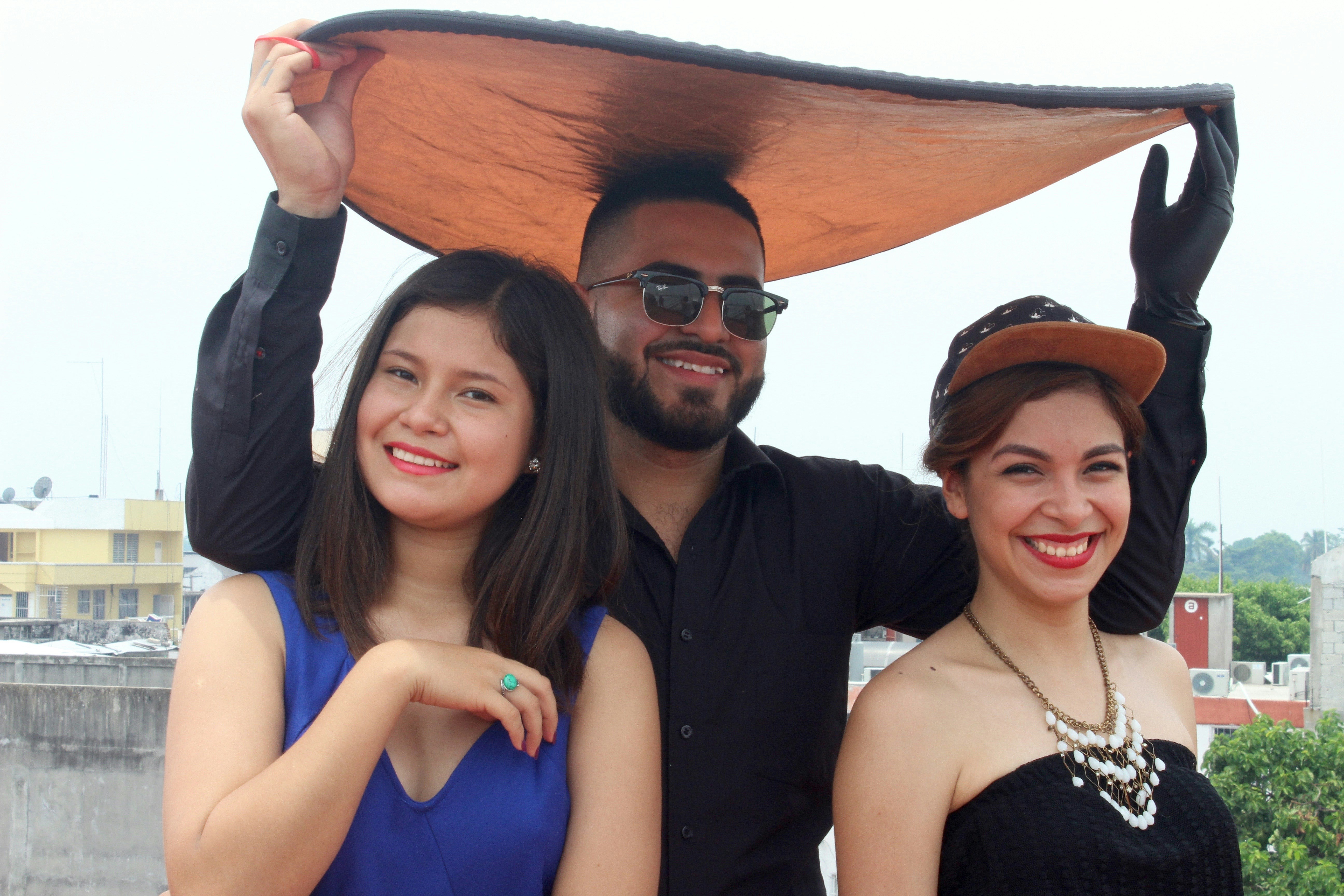 A group of people standing next to each other