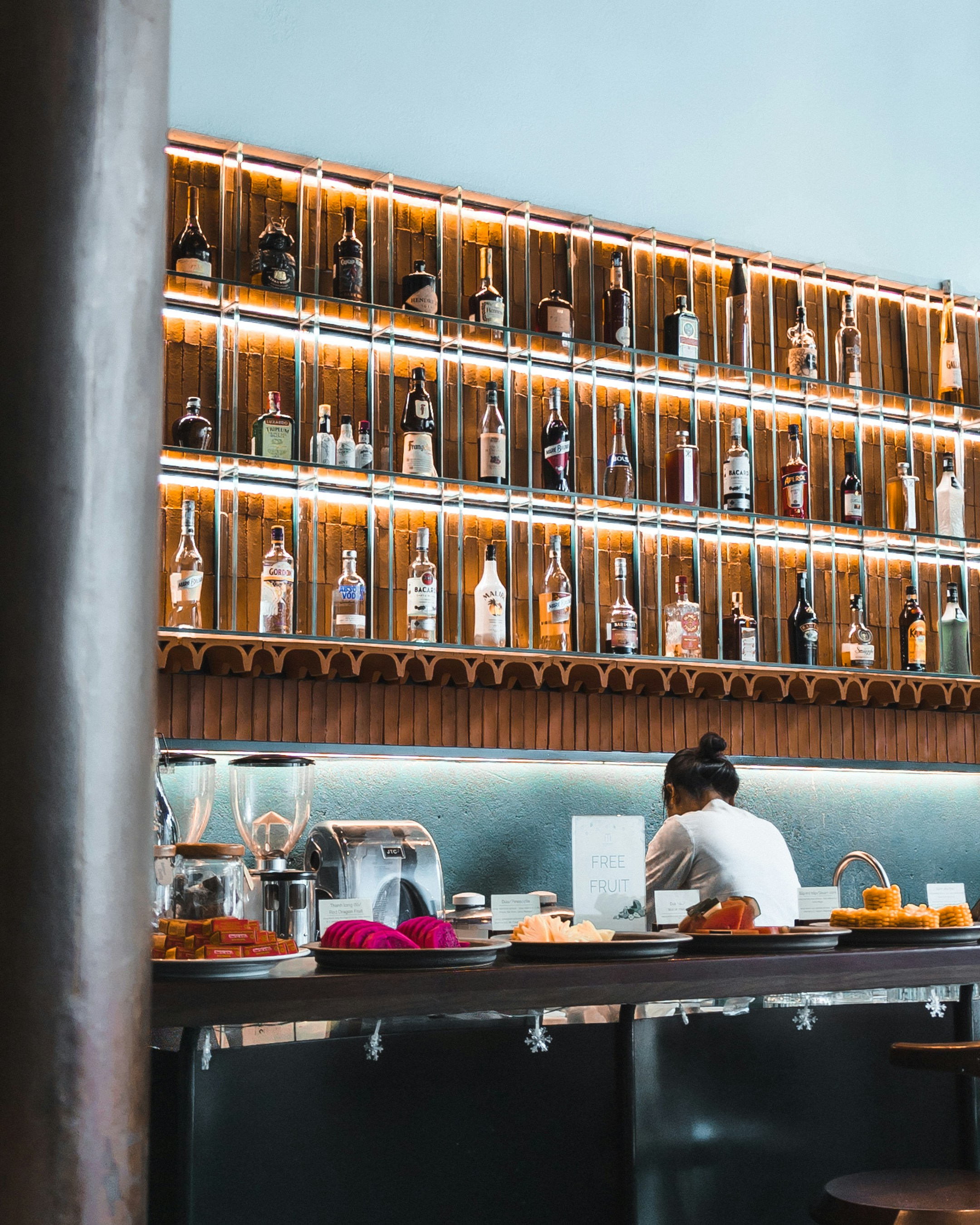 A woman is preparing food in a restaurant