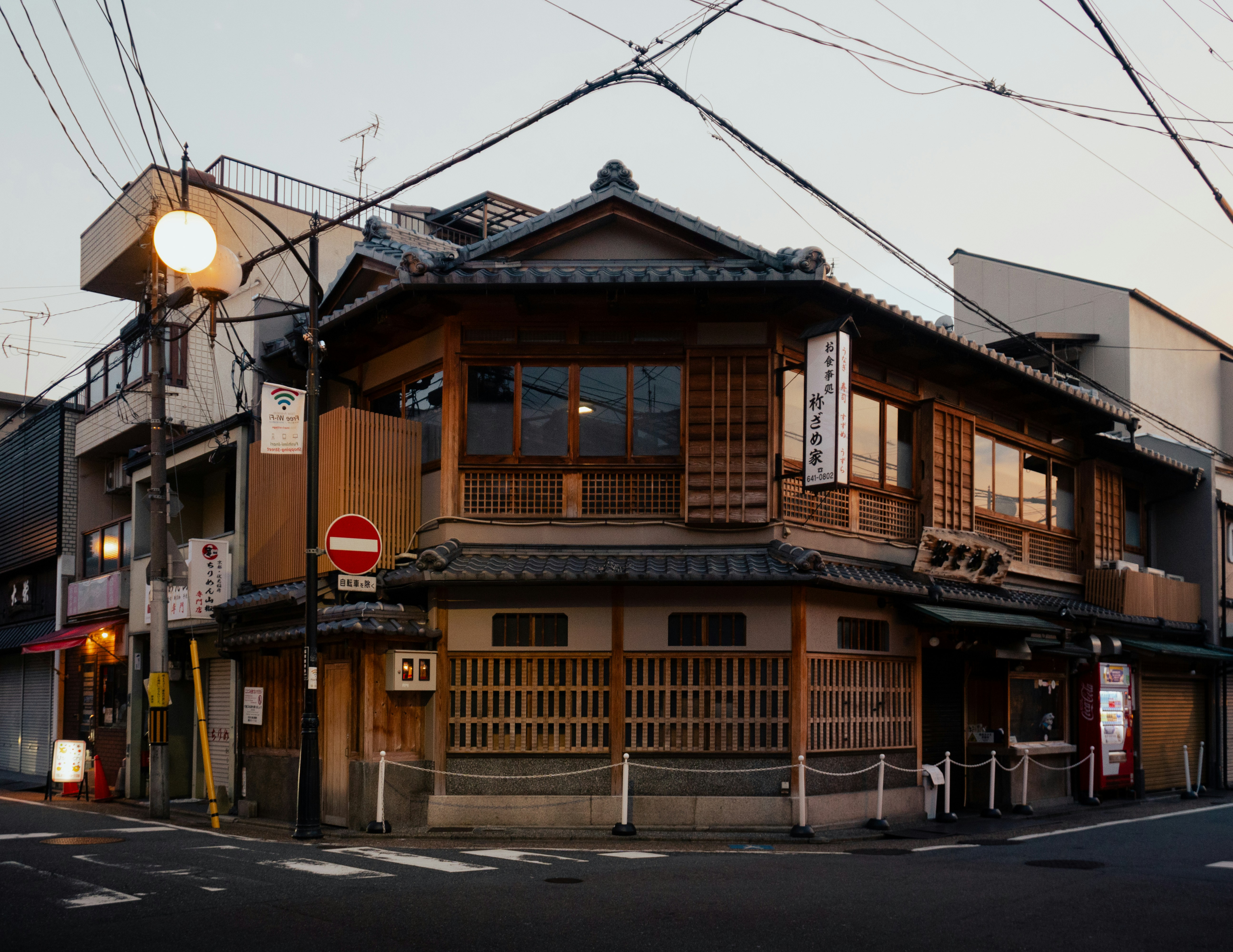A street corner with a building on the corner