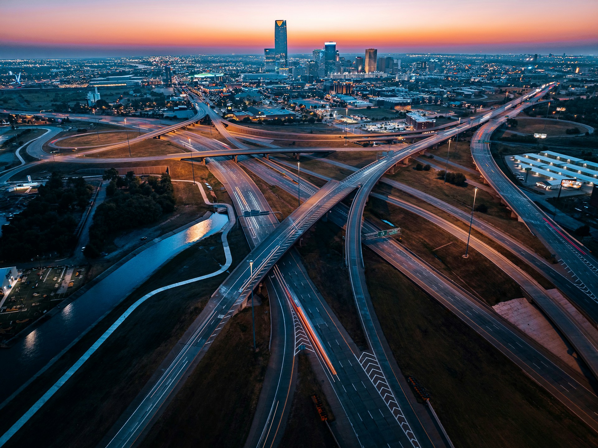 An aerial view of a city at sunset