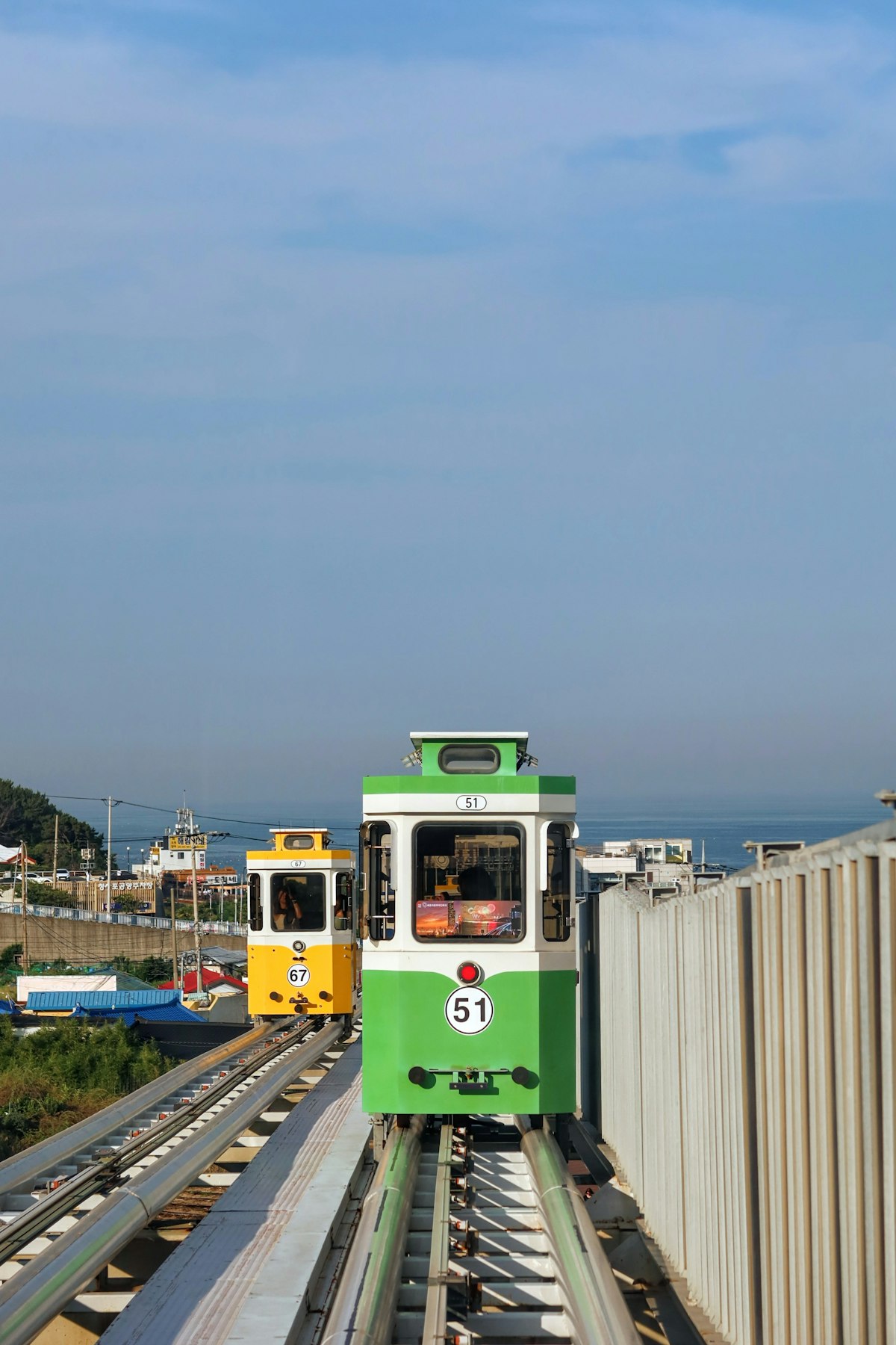 Gamcheon Culture Village Busan — colourful stacked houses on a steep hillside above the city