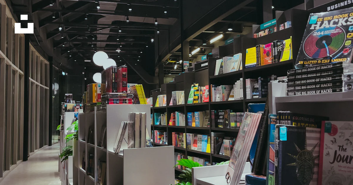 A library filled with lots of books and magazines photo – Free Building ...