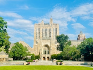 A view of a building from across the lawn