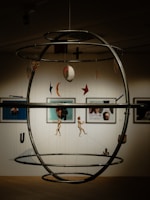 A room with a circular object hanging from the ceiling