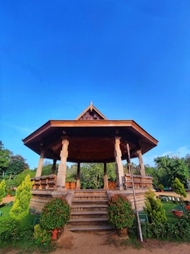 A gazebo with steps leading up to it