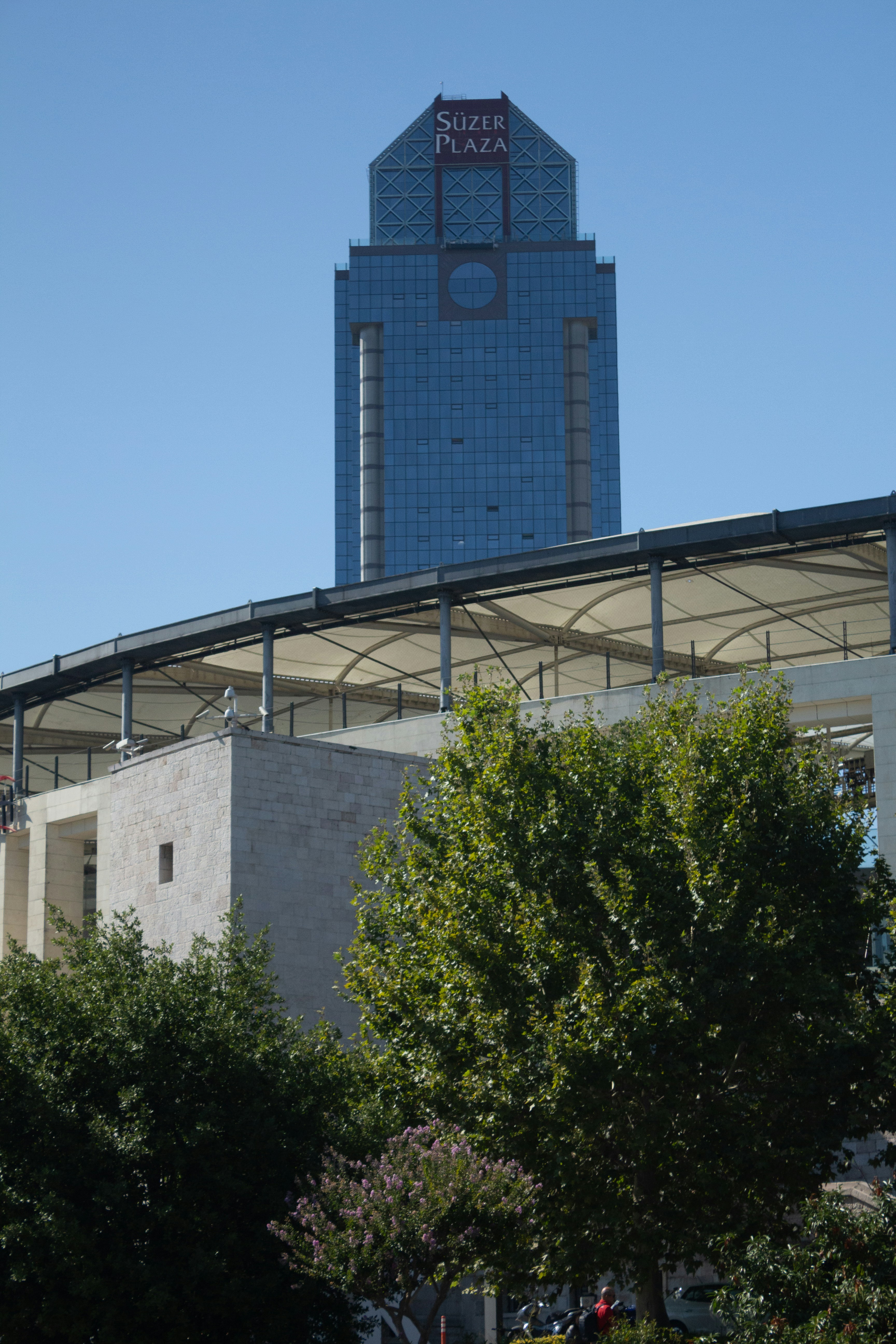 A tall building with a clock on the top of it