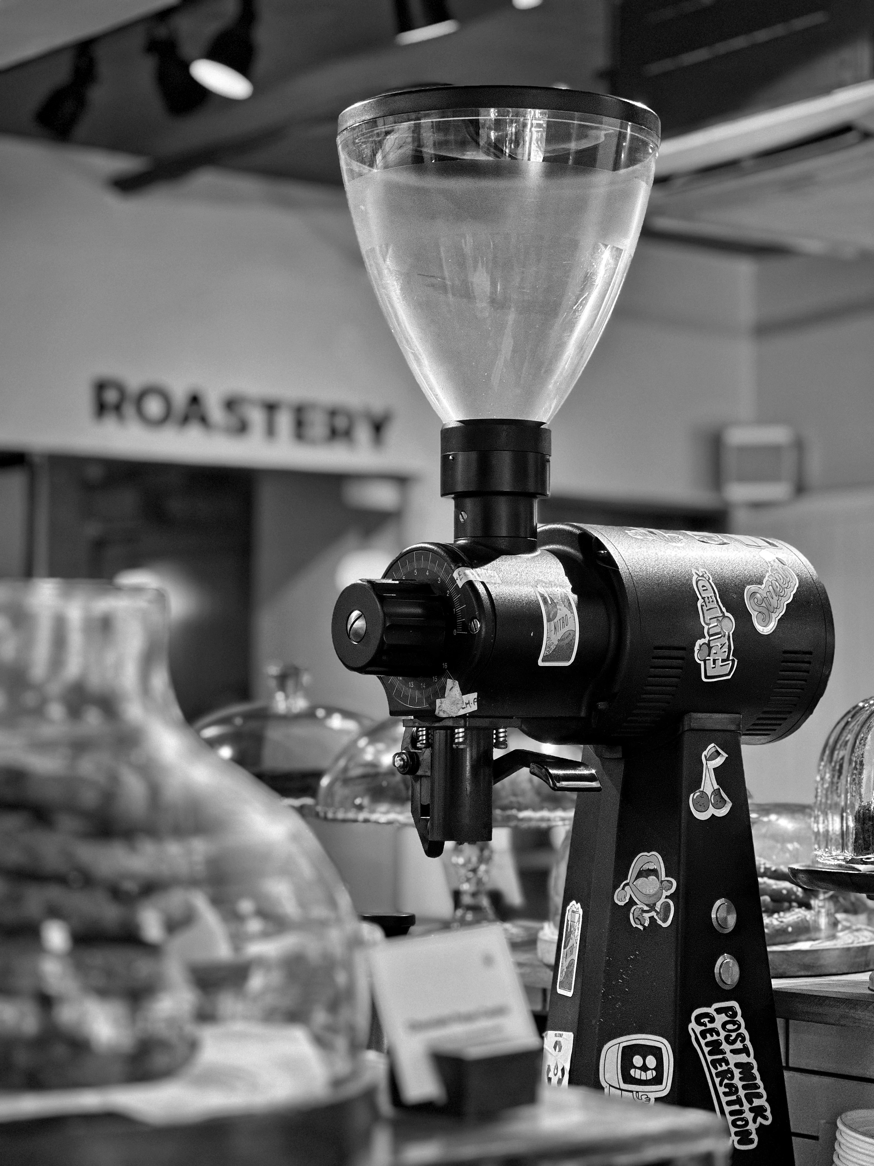 A black and white photo of a coffee machine
