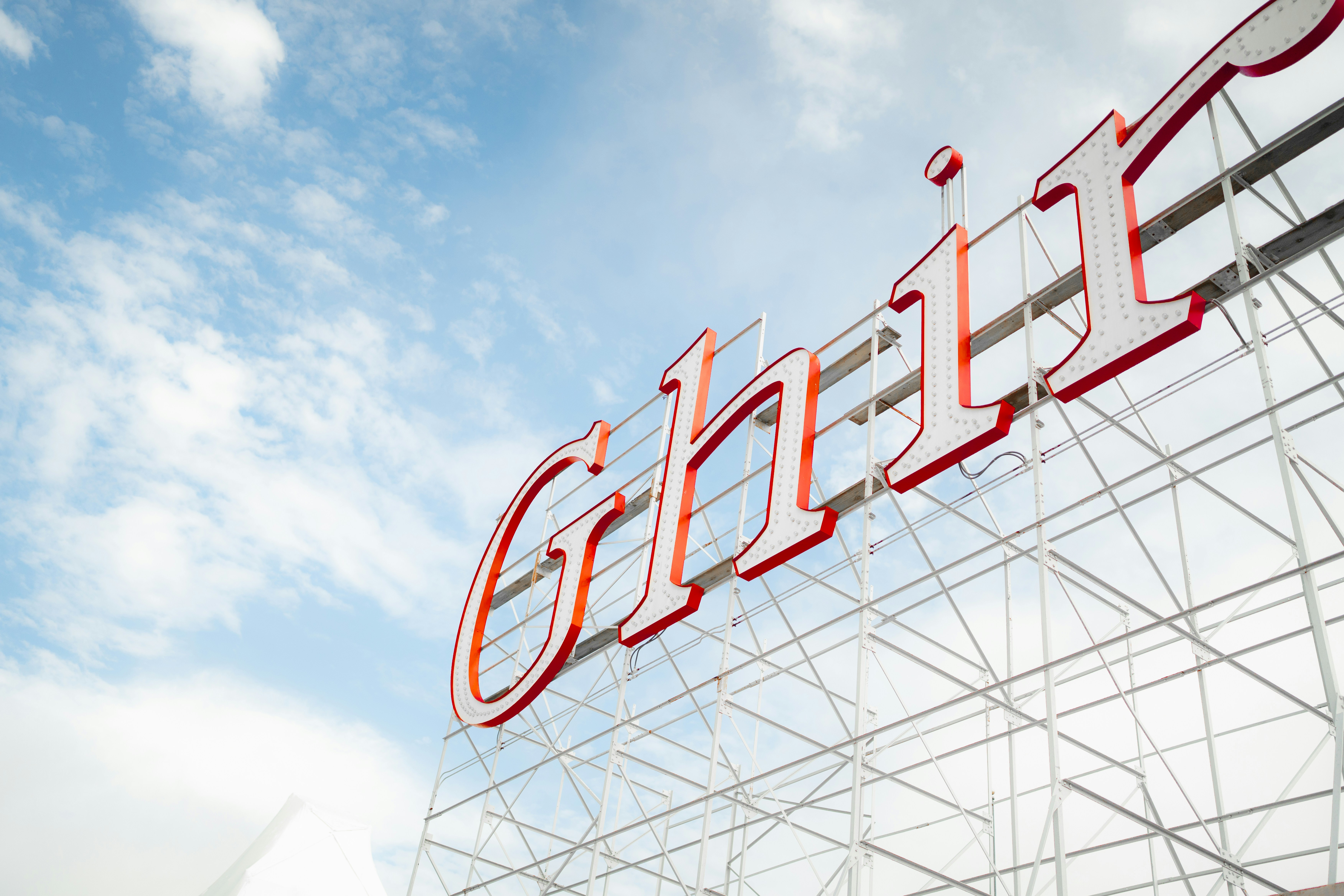 A large sign that is on top of a building