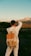 A man is taking a picture with his cell phone