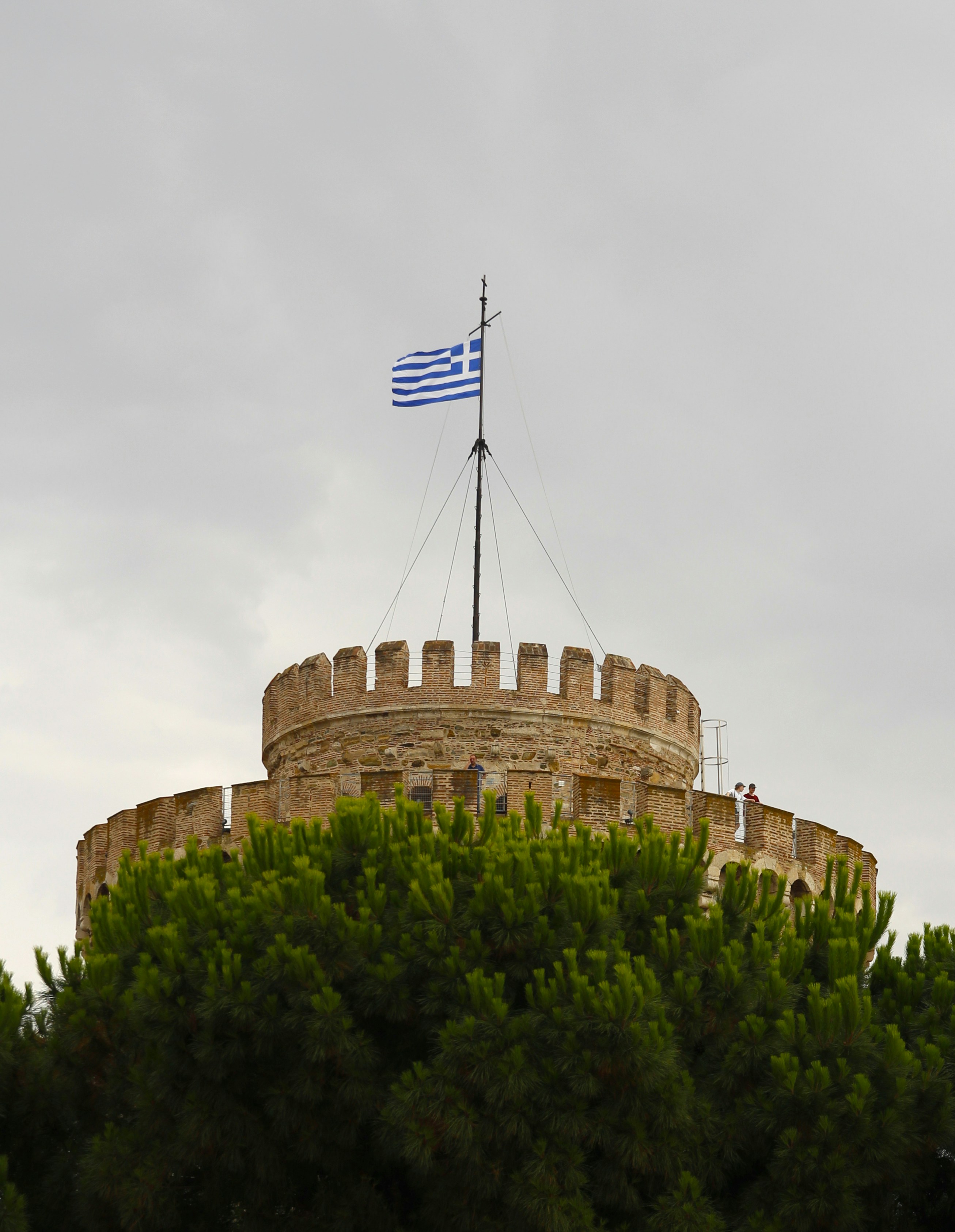 A flag is flying on top of a castle
