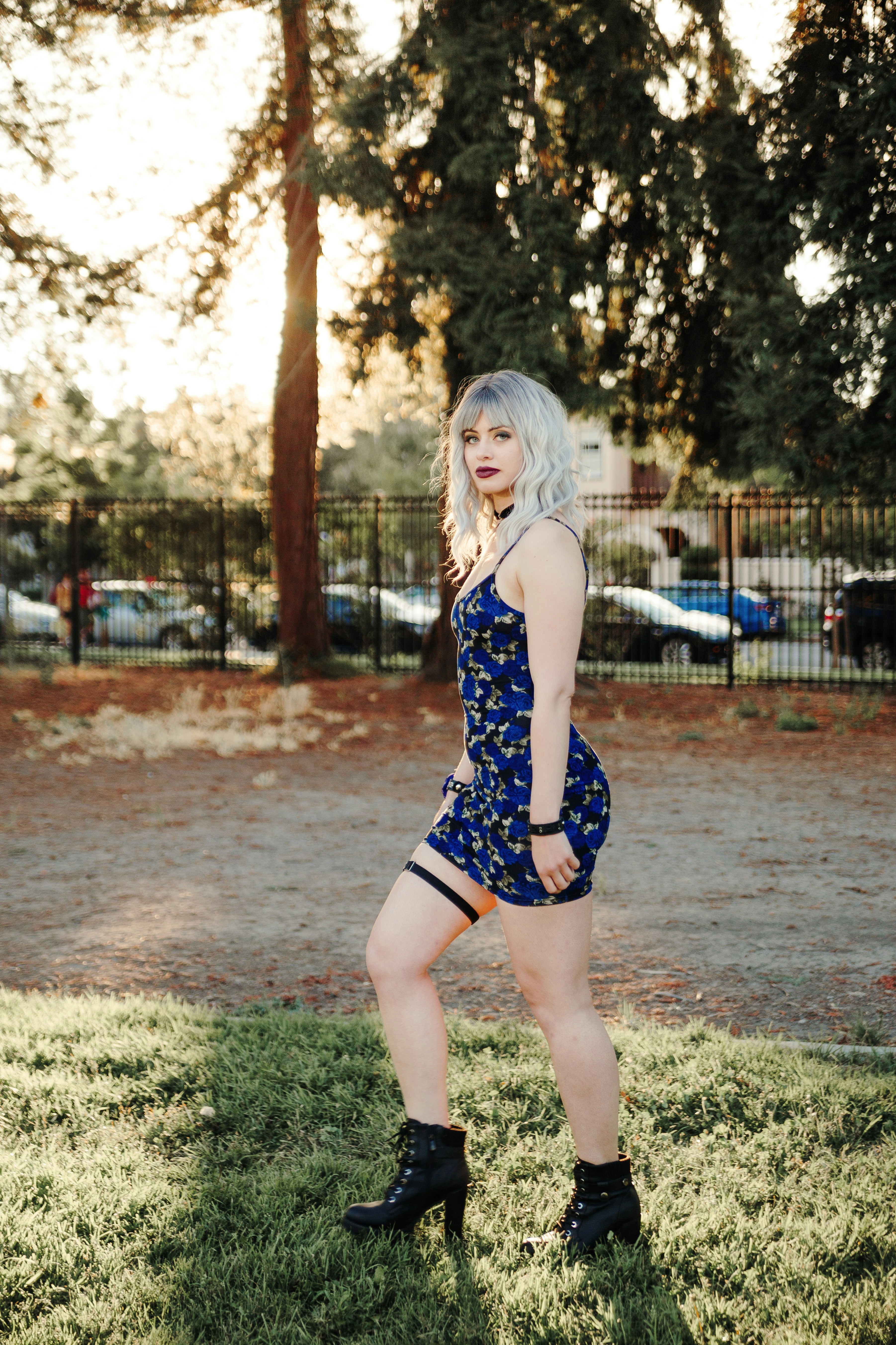 Customer photo of floral dress close-up detail, natural outdoor lighting