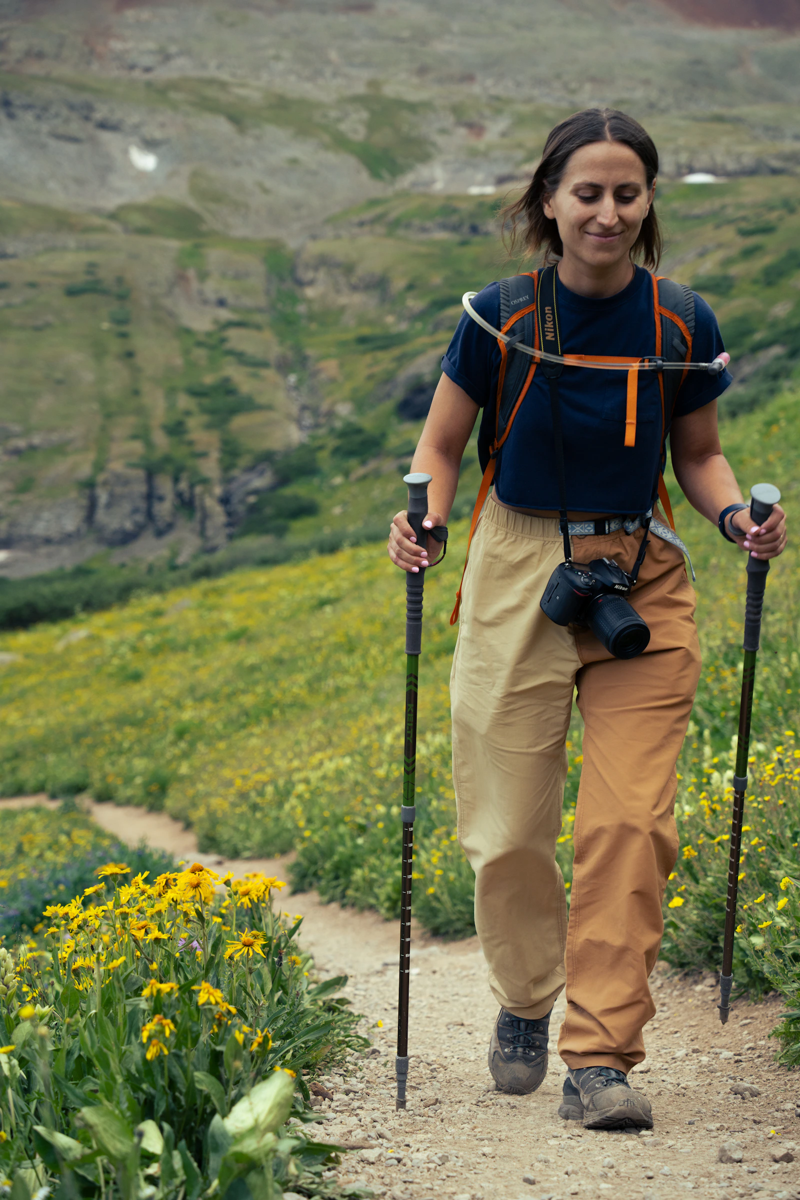 Woman hiking on a mountain trail