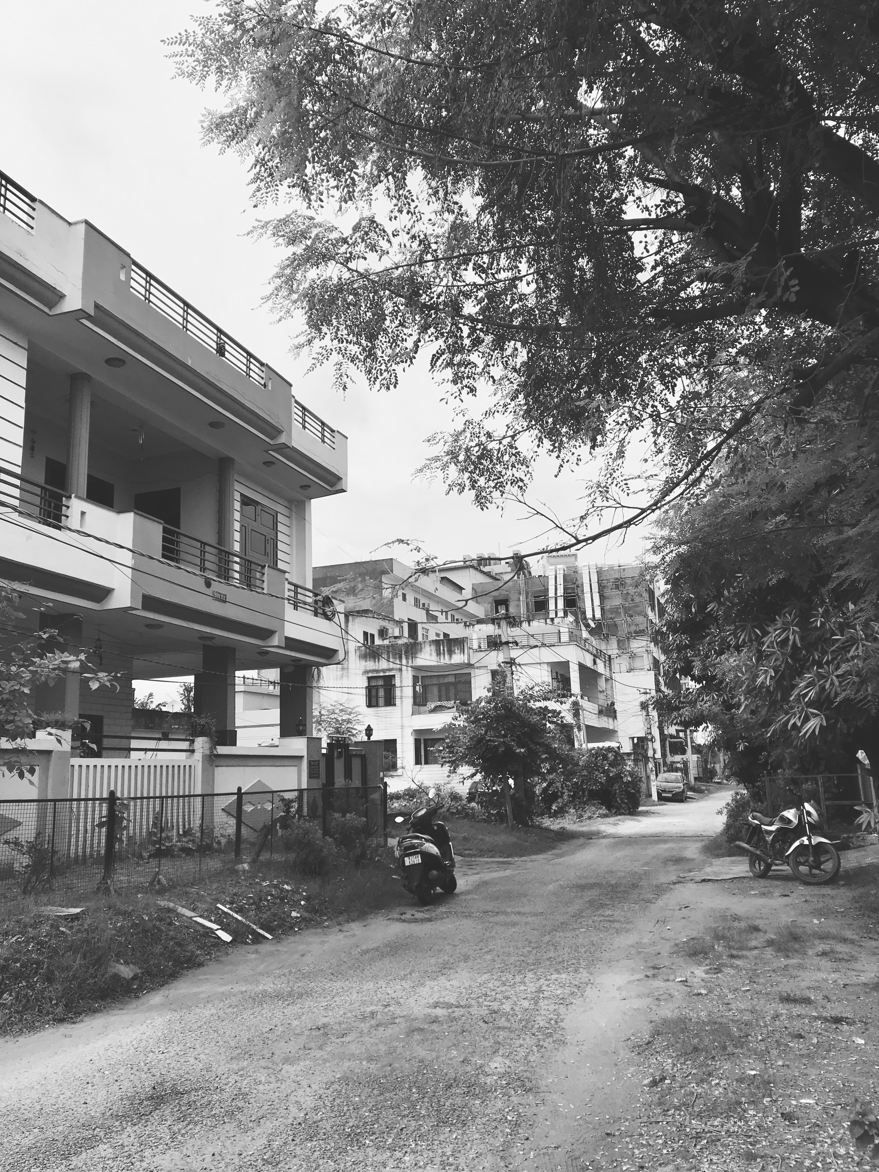 A black and white photo of a street