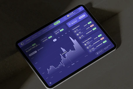 A cell phone displaying a stock chart on the screen