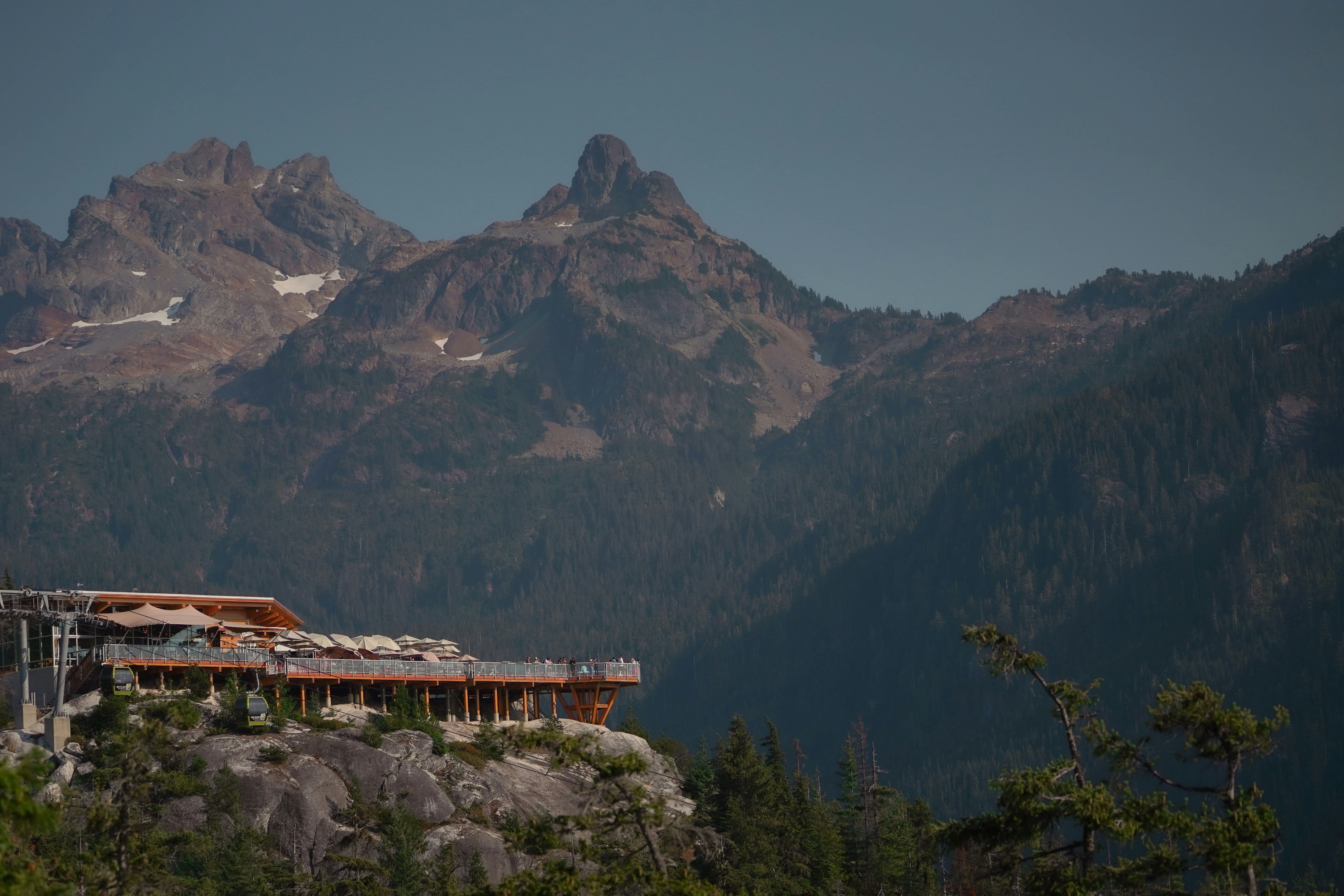 Large building on lush green hillside